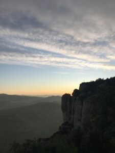 The Creu de Sant Miquel viewpoint above Montserrat monastery seen from a distance