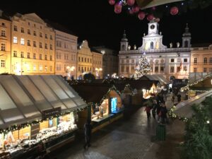 Christmas market on Přemysl Otakar II Square with the illuminated town hall