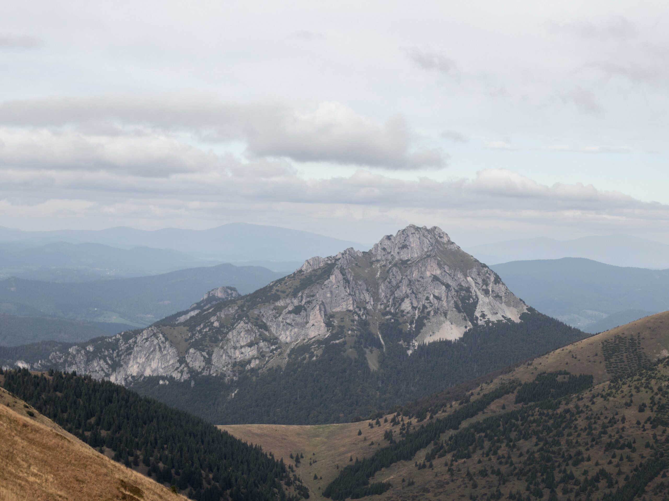 The rocky pyramid summit of Veľký Rozsutec rising above the wooded slopes of the Malá Fatra