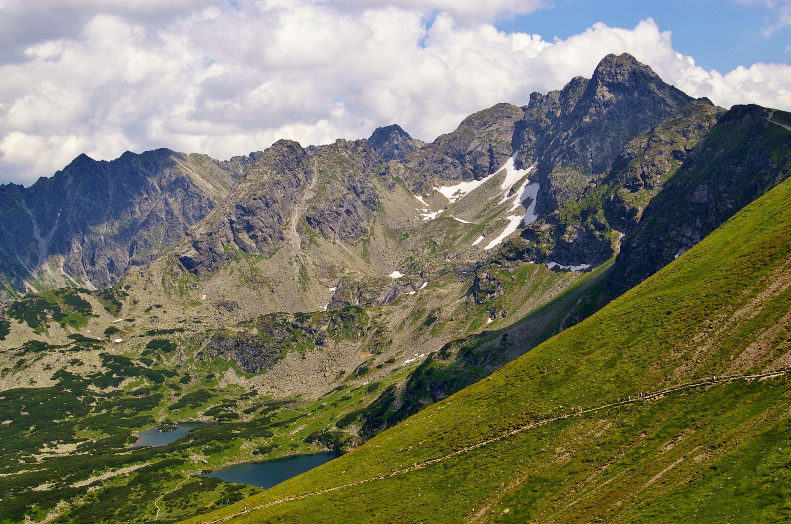Rocky peaks of the Polish Tatra Mountains under a blue sky