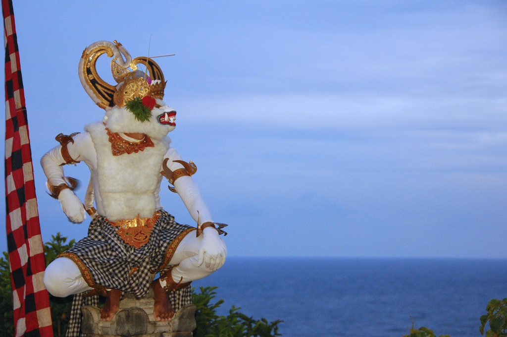 Hanuman during the Kecak dance at Uluwatu, with the ocean in the background