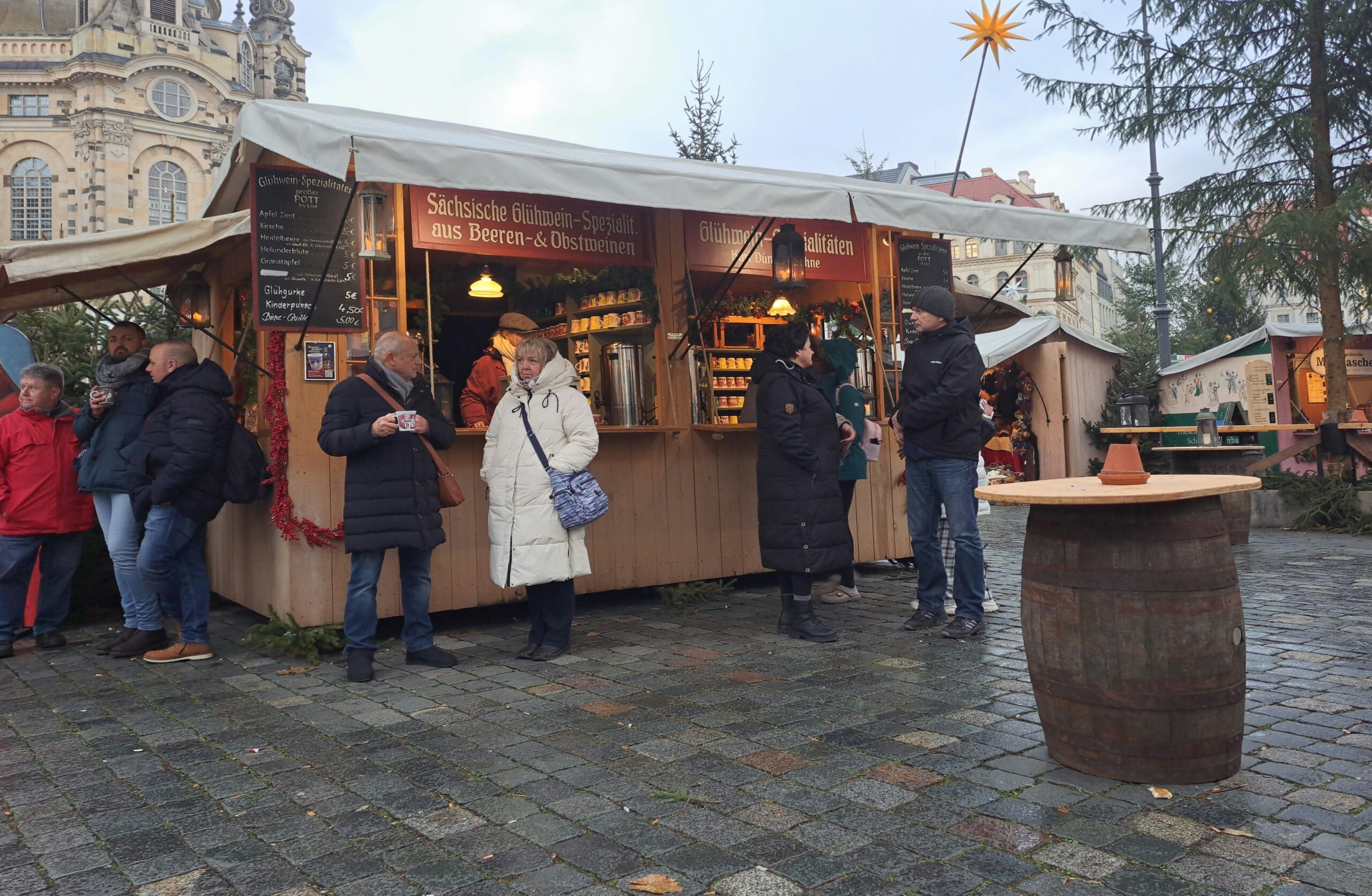 Stall selling Saxon mulled berry and fruit wines at the Christmas market by the Frauenkirche in Dresden